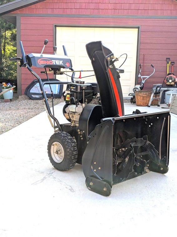 Ariens Sno-Tek electric start snow blower with 24" cut, has a 208cc engine. Looks barely used and runs well. Tires