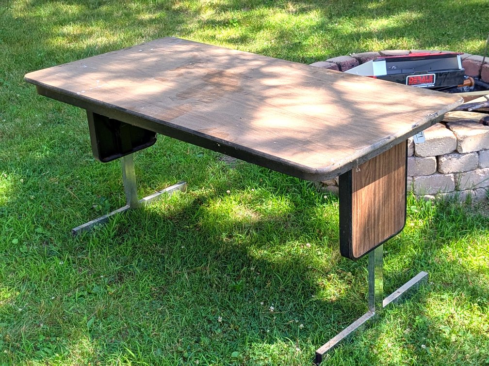 Folding table measures 30"x 60" over top.