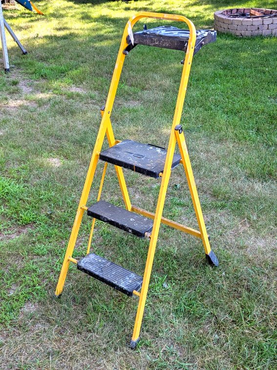 Skinny Mini folding step ladder is approx 4' overall.