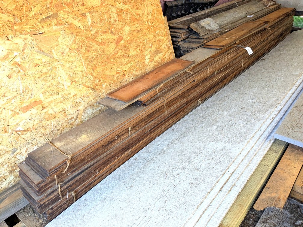 Genuine taper-sawn cedar siding is 7" wide, pile is 15" tall, 14 long random lengths.