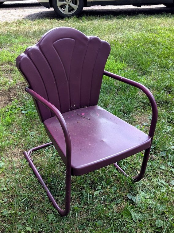 Striking purple stamped steel lawn chair measures 16" to seat.