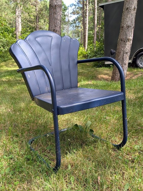 Bold blue stamped steel lawn chair measures 16" to seat.