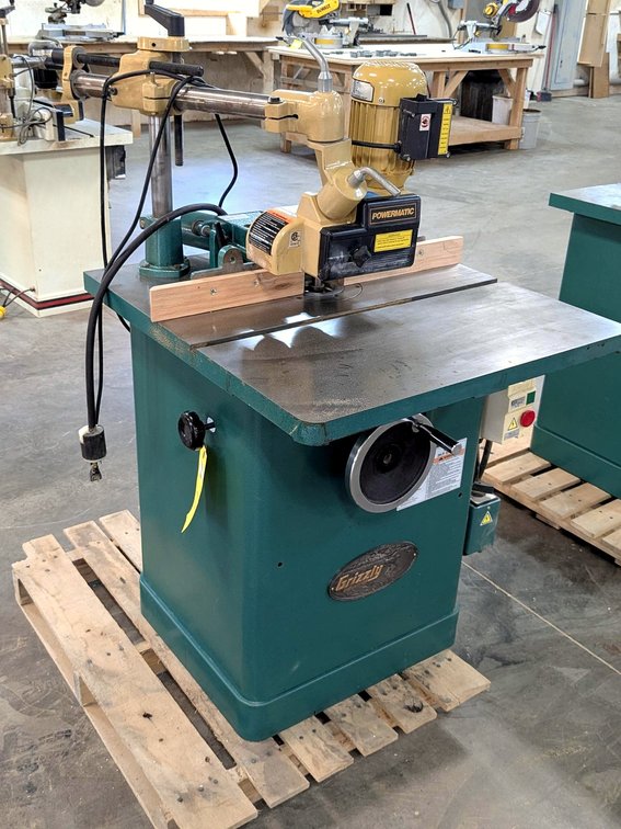 Grizzly industrial grade 3 hp shaper is Model G1026 and has a Powermatic automatic feed system.