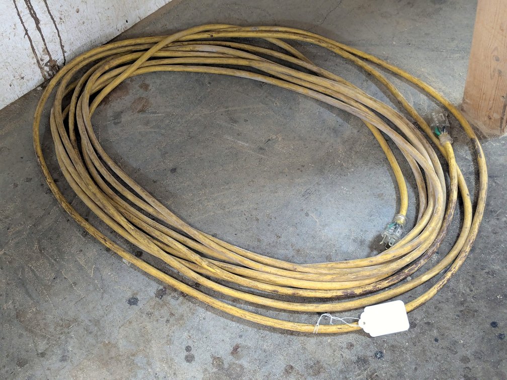 12 gauge extension cord is 3' over length of coils.