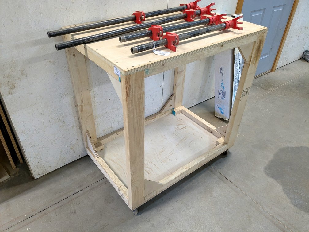 3' rolling work bench is about 2' x 3'.