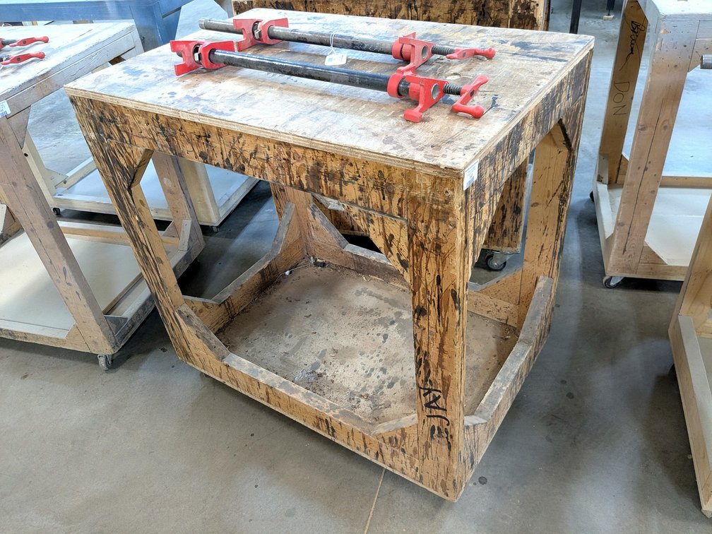 3' rolling work bench is about 2' x 3'.
