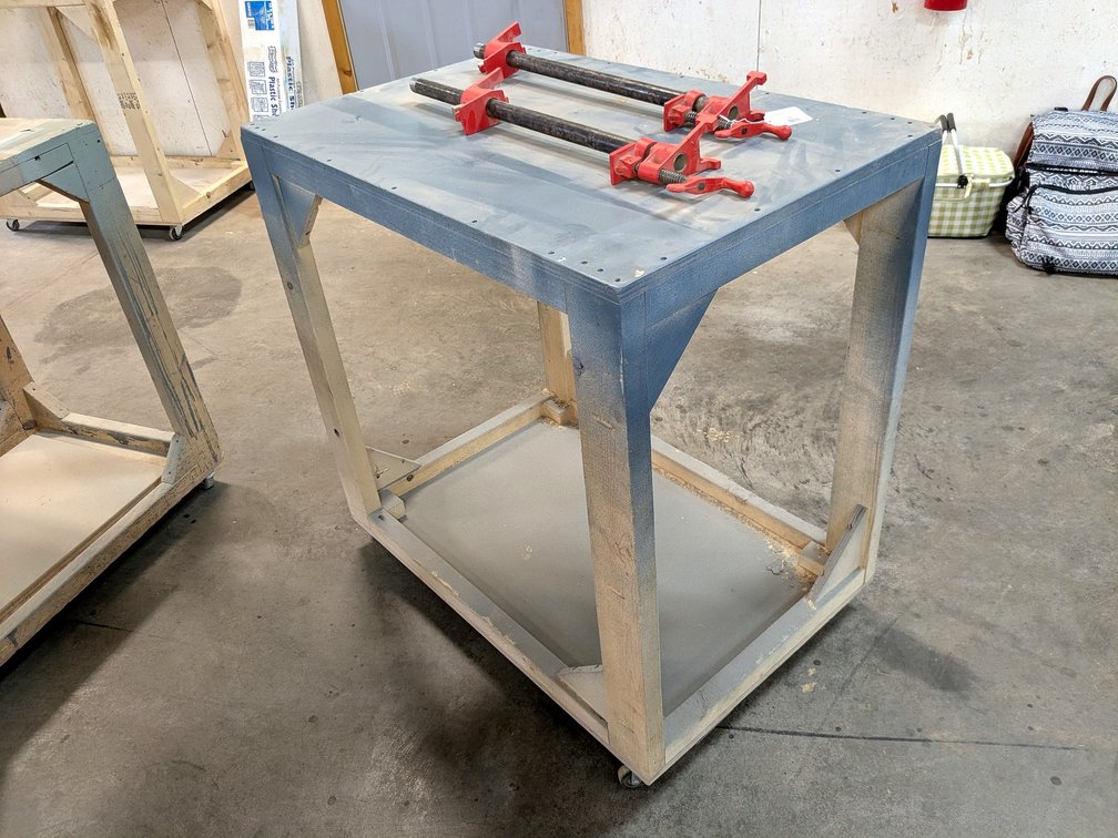 3' rolling work bench is about 2' x 3'.