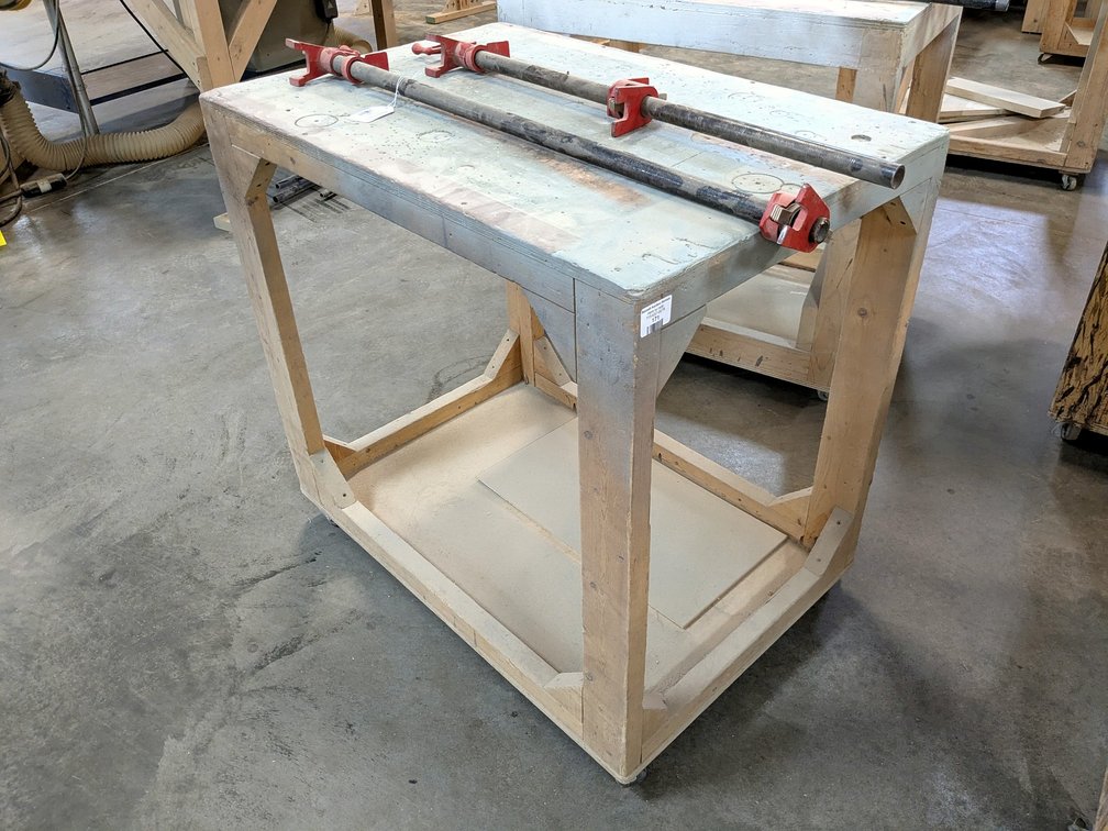 3' rolling work bench is about 2' x 3'.