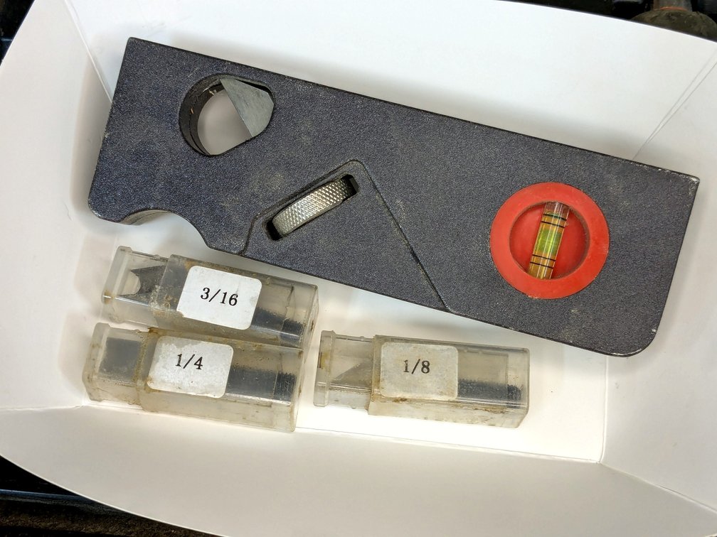 Chamfer plane measures 6" and has four replaceable blades.