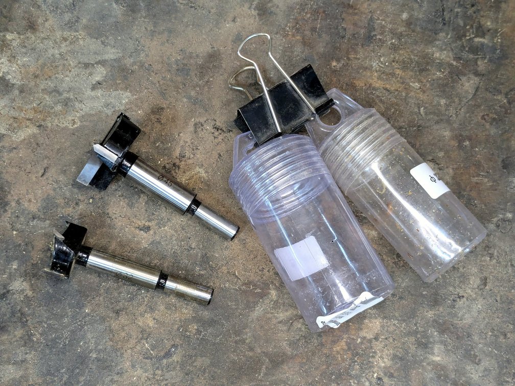 Pair of Forstner bits up to approx. 1-3/4", larger is marked 45.