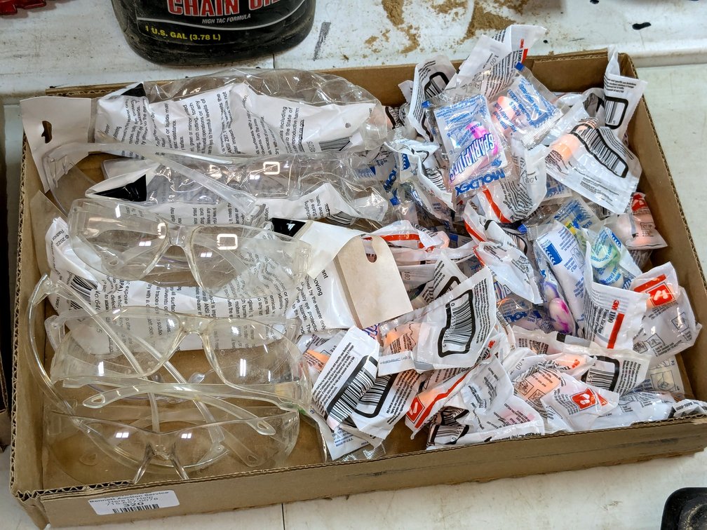 Safety glasses and ear plugs including 3M brand and other.