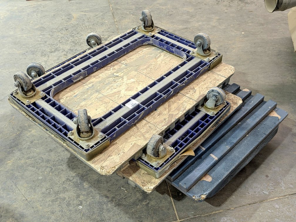 Three rolling furniture dollies up to 31" wide.