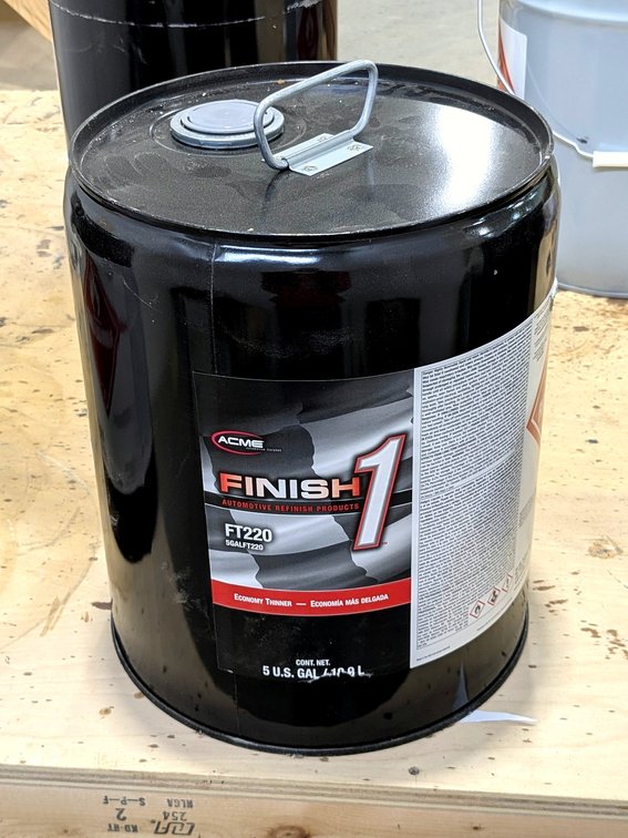No shipping.  Acme economy thinner is No. FT220 and five gallon bucket feels full.