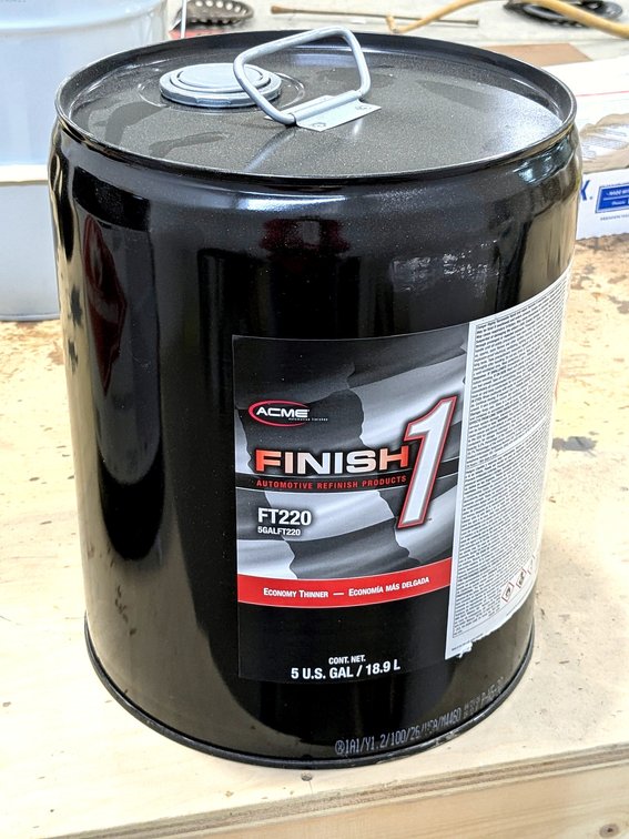 No shipping.  Acme economy thinner is No. FT220 and five gallon bucket feels full.