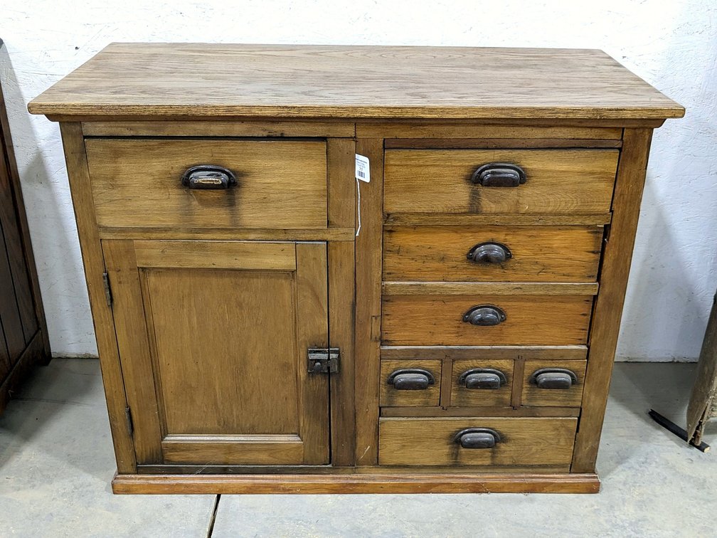 Neat old wooden cabinet measures 42" wide x 20" x 34" high and has dovetailed drawers.
