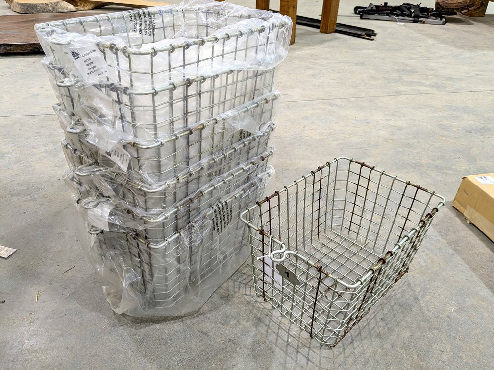 Seven wire storage or organizer baskets are each 13" x 9" x 8" tall.