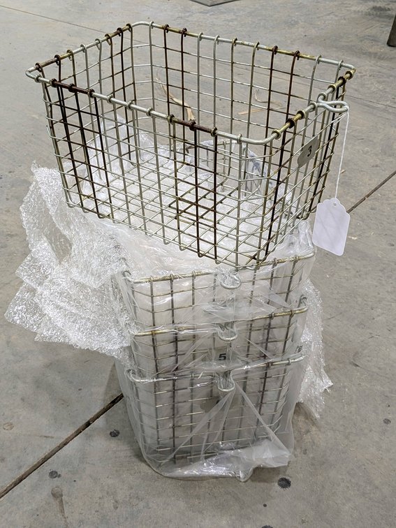 Four wire storage or organizer baskets are each 13" x 9" x 8" tall.