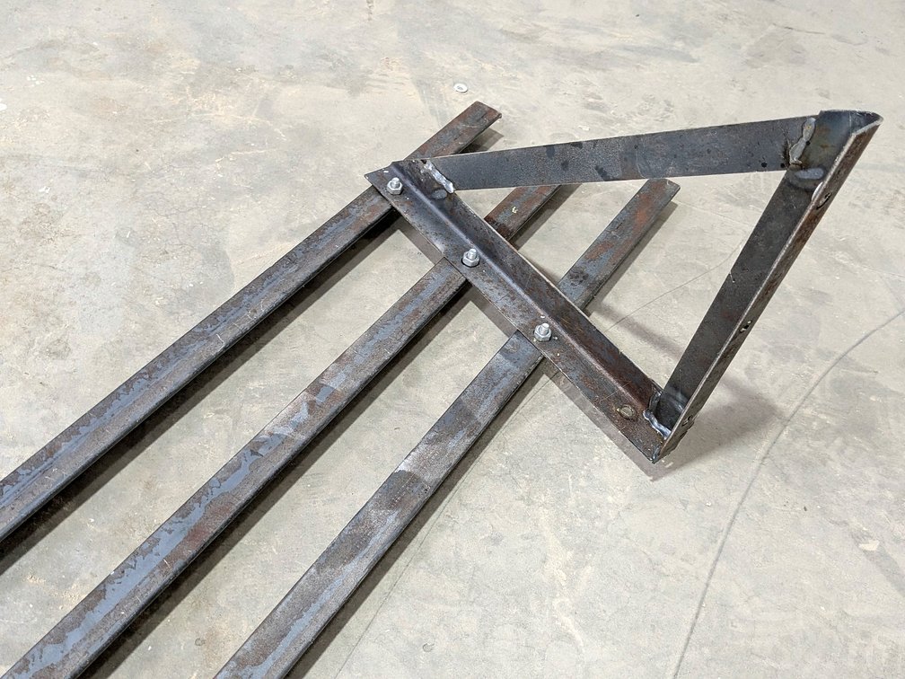 Heavy duty steel shelf measures 10' long and 12" wide.