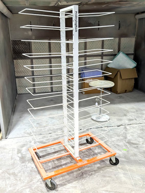 The PaintLine brand drying rack stands 6' tall and has a 38" wide x 24" base.