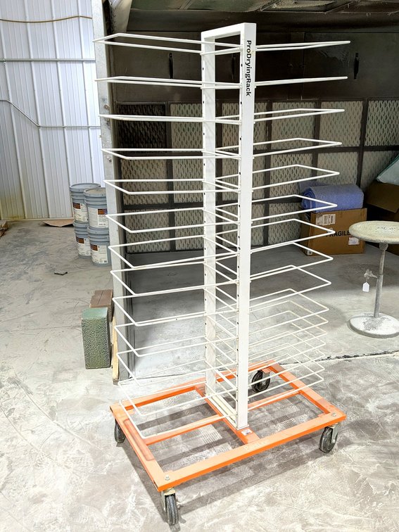 The PaintLine brand drying rack stands 6' tall and has a 38" wide x 24" base.