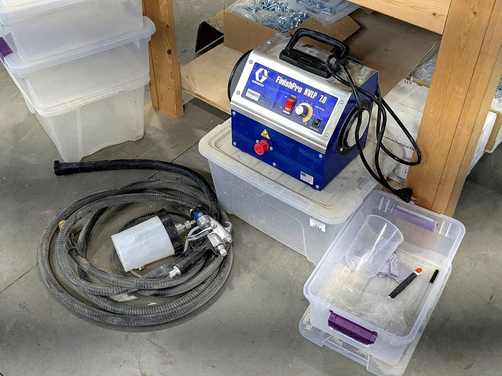 Graco Finish Pro HVLP 7.0 sprayer unit with hose and gun.
