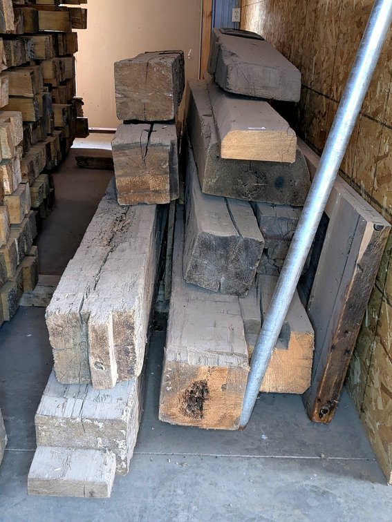 Hand hewn barnboard beams and planks up to 14" wide, up to 8" thick, and up to 14' long.