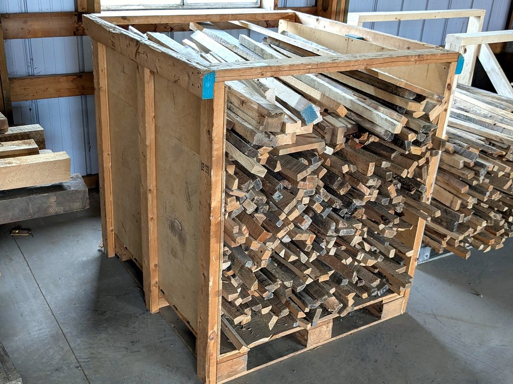 Crate of lumber drying stickers is about 4' x 4' x 4'.