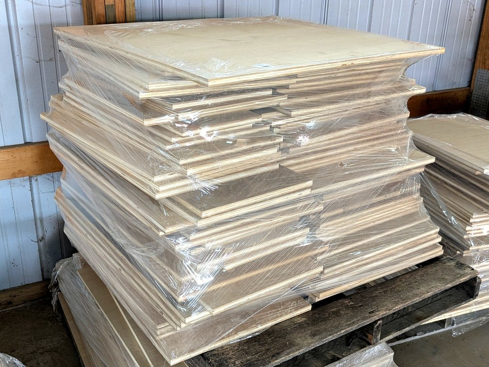 Five-ply cabinet grade plywood with oak veneer faces up to about 42" and 32" bottom stack is about 1