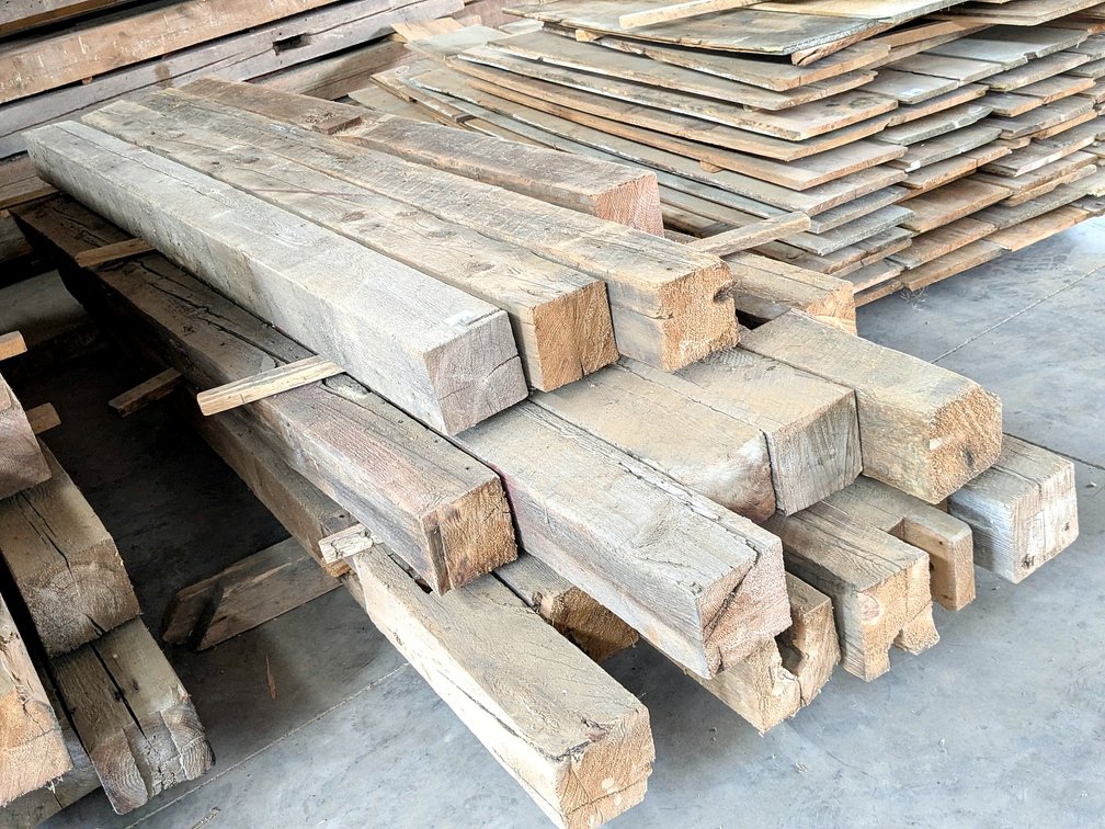 Bunk of 6x6 hand hewn barn beams up to about 11'.