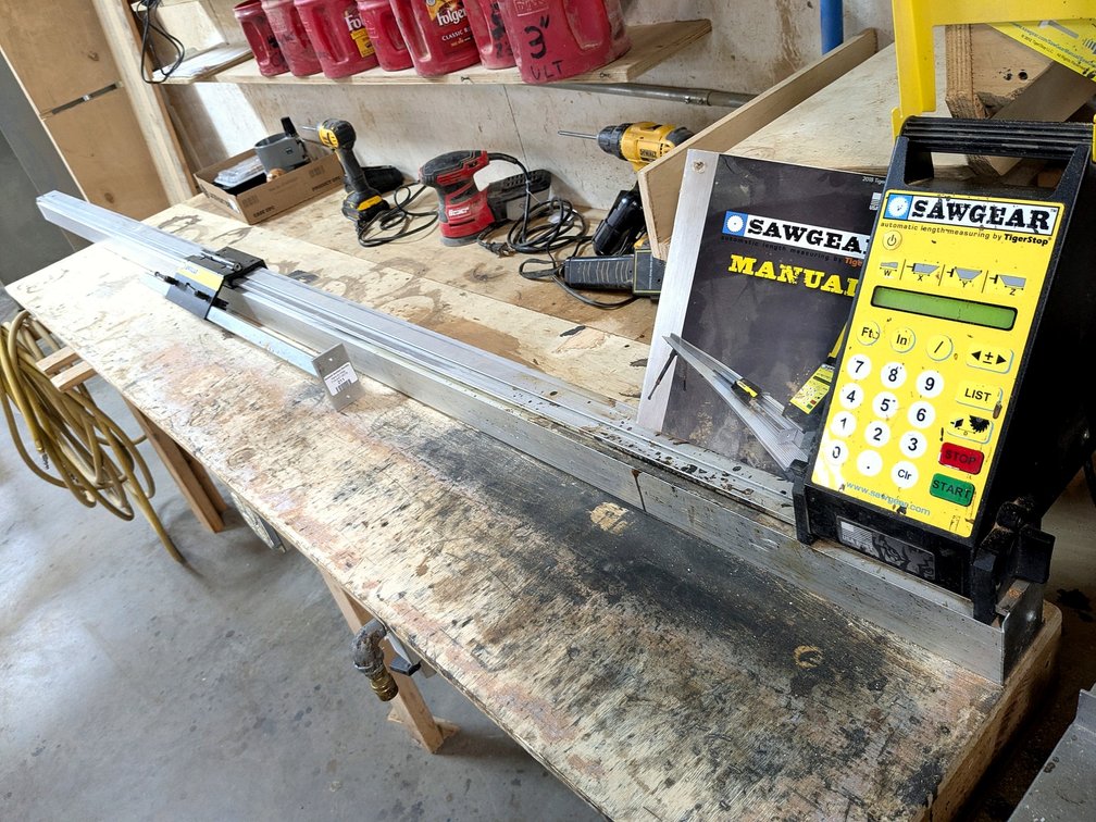 SawGear automatic length measuring guide is nearly 10' long and comes with control panel, cords and