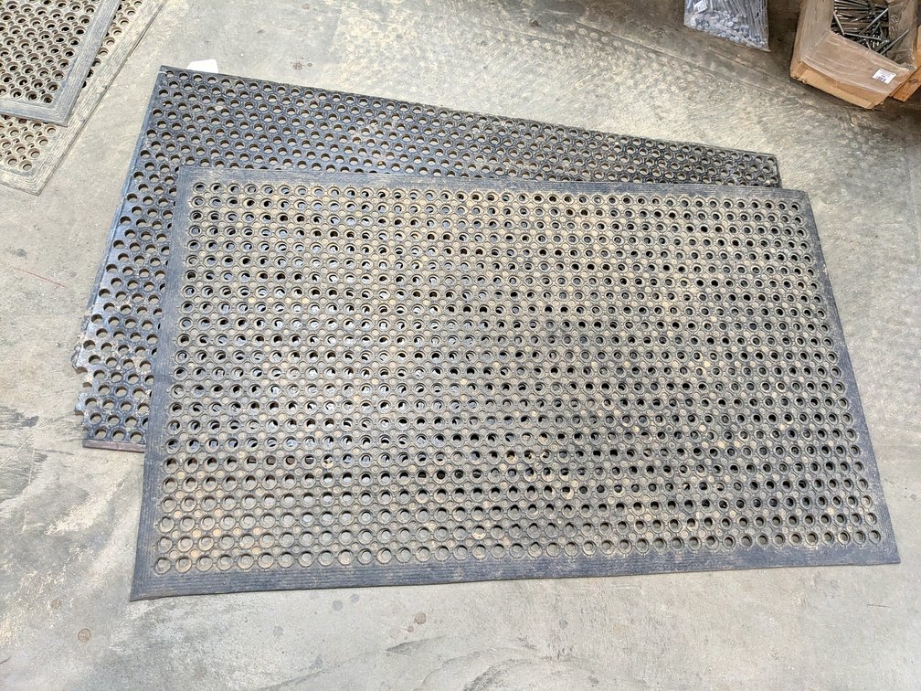 Two rubber shop mats are each approx. 5' x 3'.