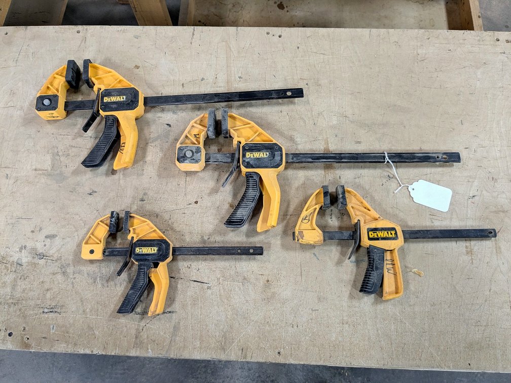Four DeWalt bar clamps up to 19" overall.