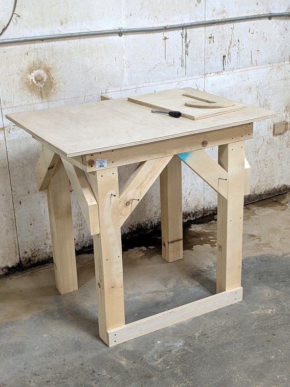 Sturdy work bench or equipment table measures 38" x 27" x 35" high.