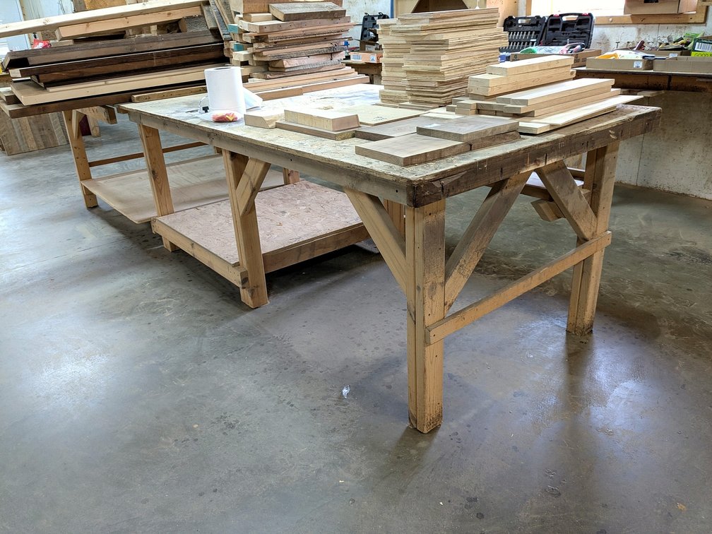 Heavy duty work bench measures 4' x 12' long x 35" tall.  Please bring help to remove.