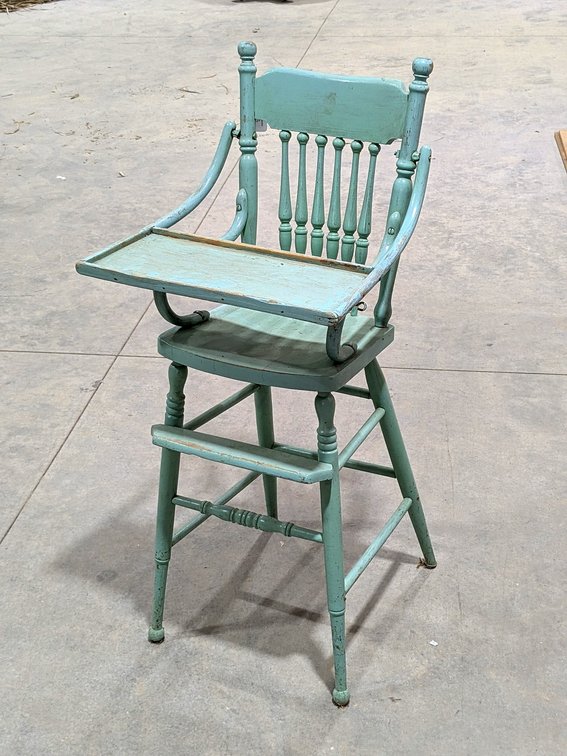 Antique high chair stands 42" tall overall.