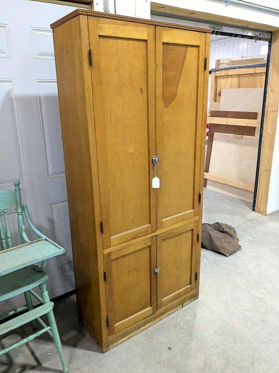 Antique pantry cabinet measures 34" wide x 74" tall x 14" deep.