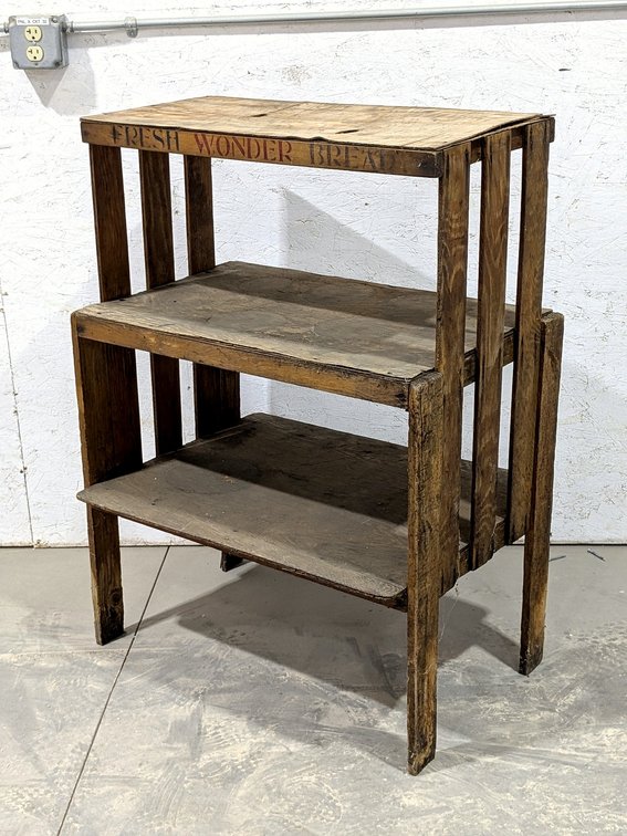 Cool rustic shelving unit is made of old crates and measures 42" tall.
