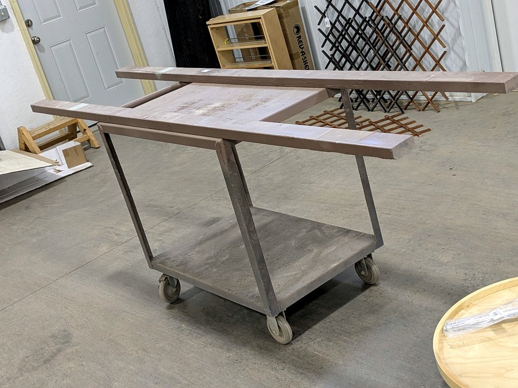 Steel rolling shop cart measures 42" x 2' x 35" tall and has two 8' 2x4 extensions attached.