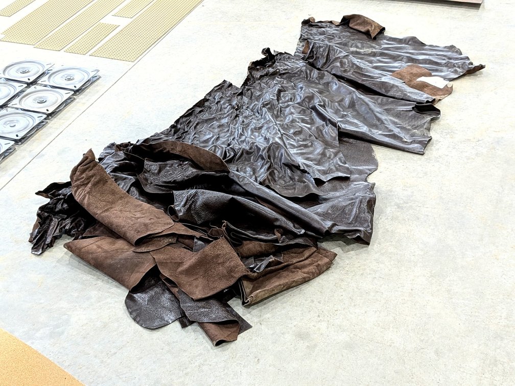 Carroll Leather upholstery scraps largest approx. 3-1/2' x 3'.