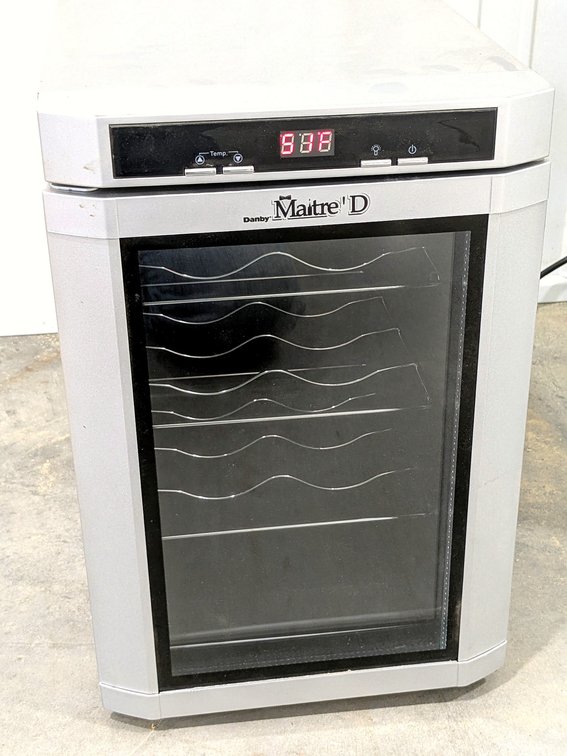 Danby wine fridge measures 11" x 21" x 17" tall.