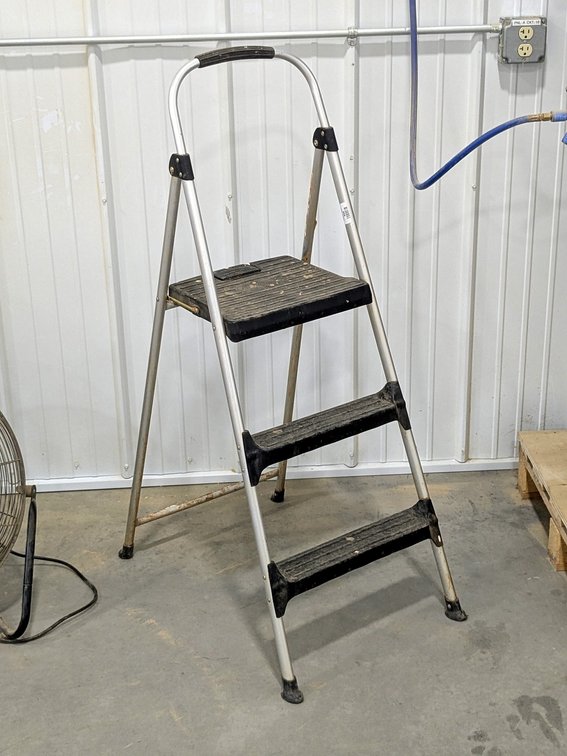 Cosco 4' folding step stool.