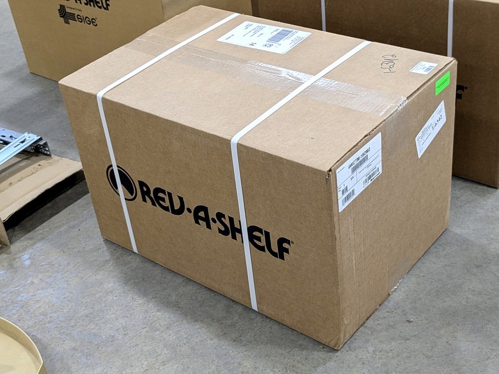 Rev-A-Shelf top mounting waste container for a 15" opening.  Google model number for specs.