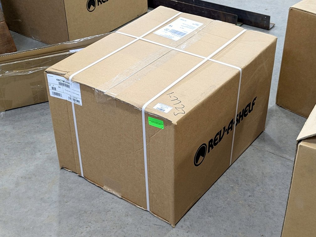 Rev-A-Shelf top mounting waste basket system for a 18" opening.  NIB.  Google model number for specs.