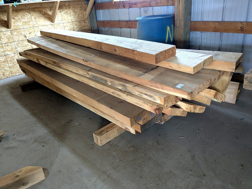Bunk of 12/4 and 8/4 rough cut pine up to 10" wide, most around 9'.