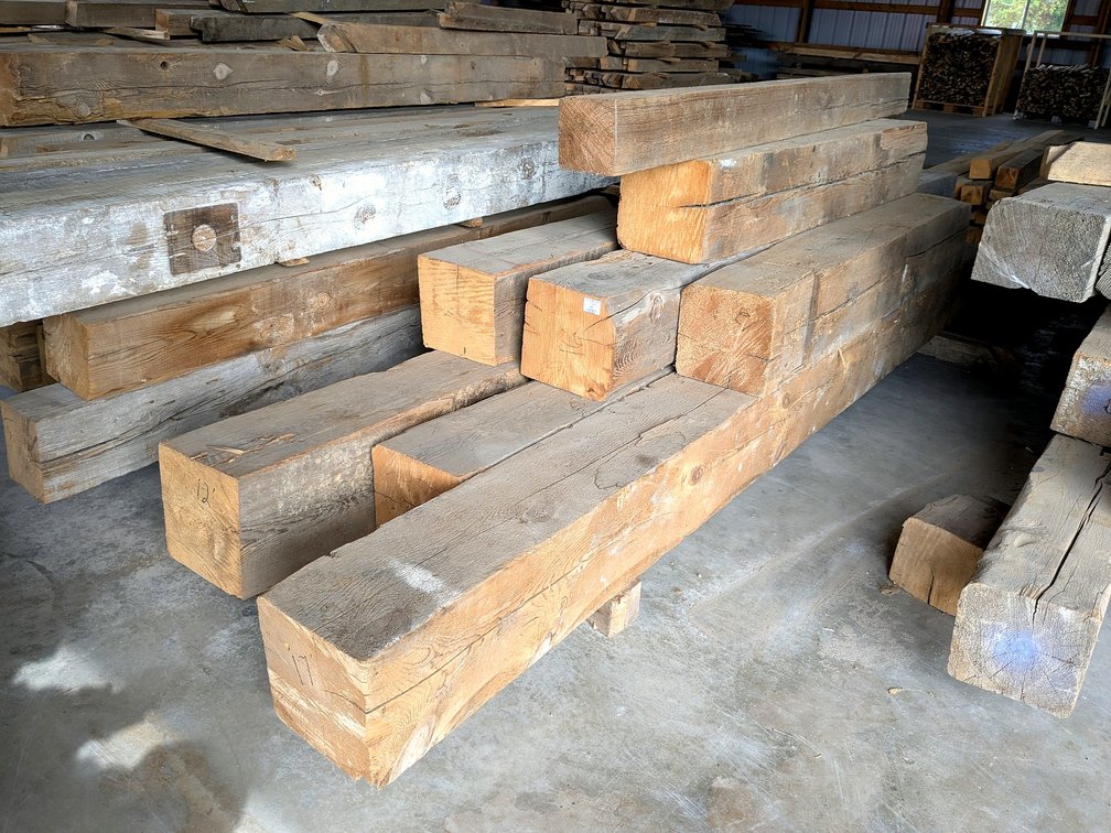 Seven impressive 10x10 reclaimed barn beams up to 148", plus a 6x6 beam.