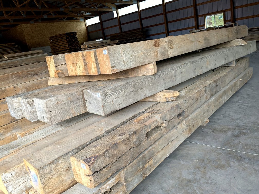 Four 10x8 reclaimed barn beams up to 140".