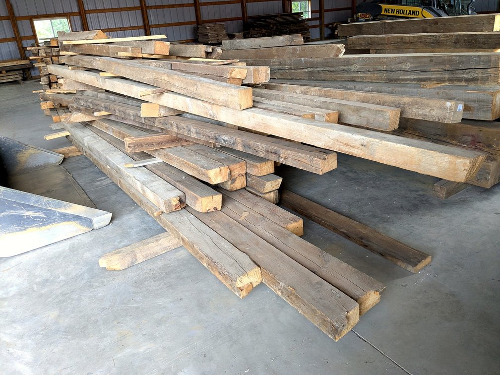 Reclaimed barn beams including 6x4, 4x4, possibly others.  Longer approx. 15'.