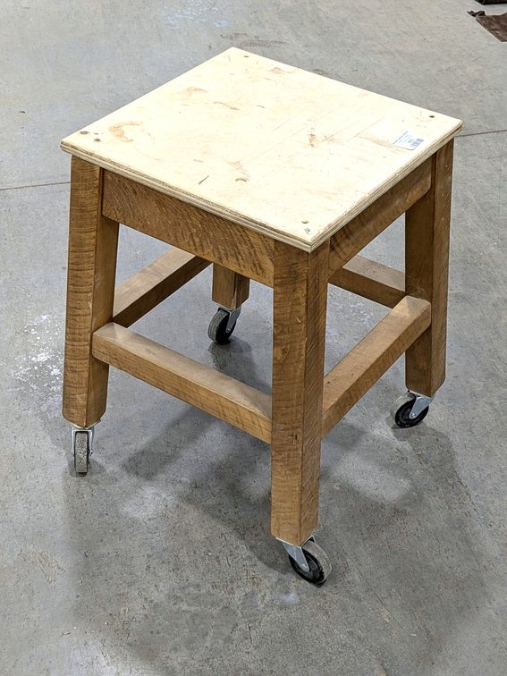 Rolling stool is 21" tall.