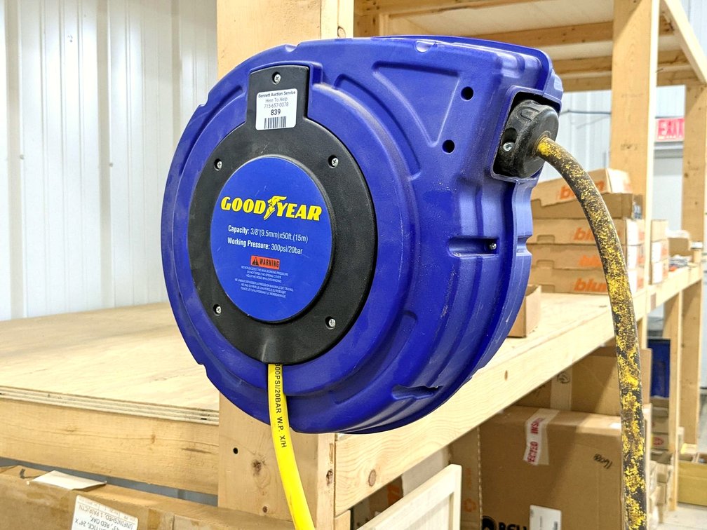 Goodyear air hose reel with 3/8" hose and ends.