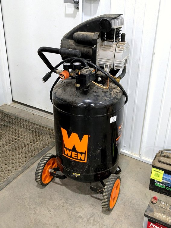 Wen 20 gallon air compressor stands 42" tall.  Runs, but does not build pressure.